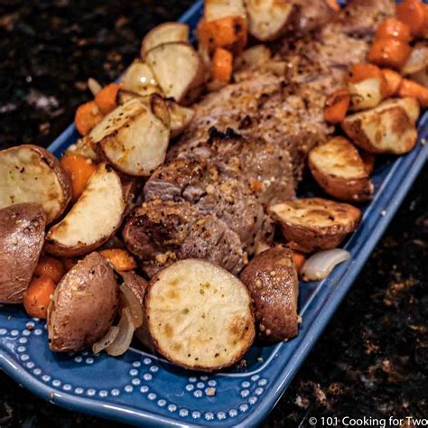 pork-tenderloin-with-potatoes-and-carrots-101-cooking image