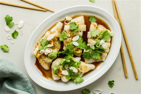 chinese-ginger-soy-steamed-fish-recipe-the-spruce image