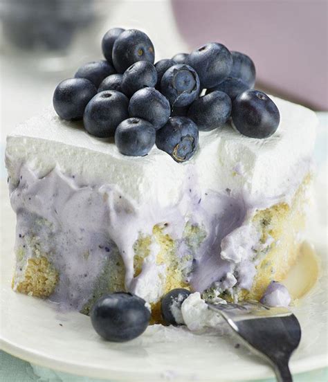 blueberry-poke-cake-a-cheesecake-poke-cake-with-fresh image