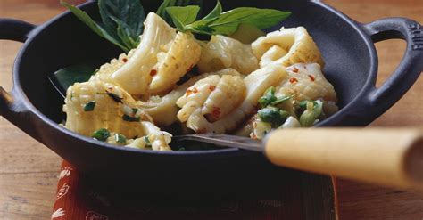 stir-fried-squid-with-ginger-scallions-and-thai-basil image