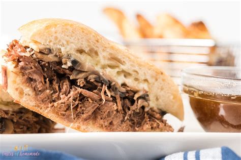 slow-cooker-shredded-beef-sandwiches-tastes-of image