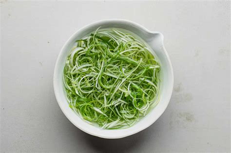 korean-scallion-salad-pa-muchim-recipe-the-spruce image