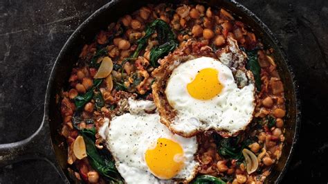 spinach-with-chickpeas-and-fried-eggs-recipe-bon-apptit image
