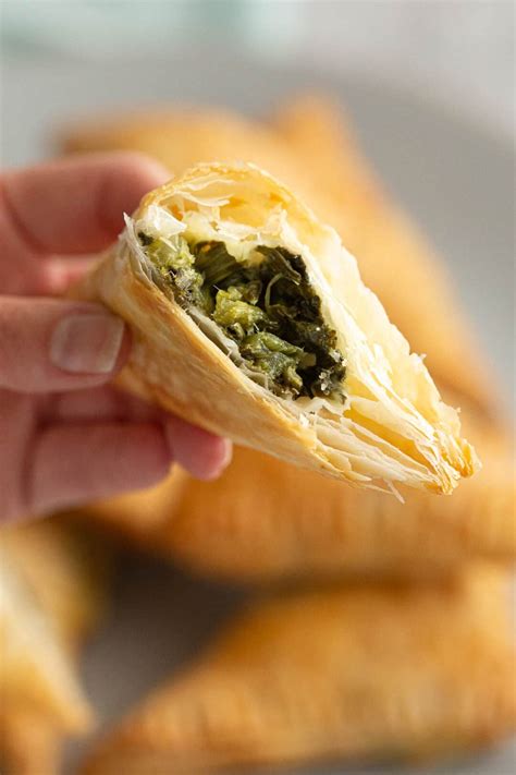 easy-spinach-feta-cheese-triangles-with-puff-pastry image