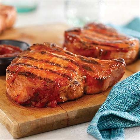 grilled-ribeye-pork-chops-with-easy-spicy-bbq-sauce image