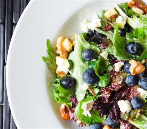 simple-salad-with-blueberries-blue-cheese-and-walnuts image