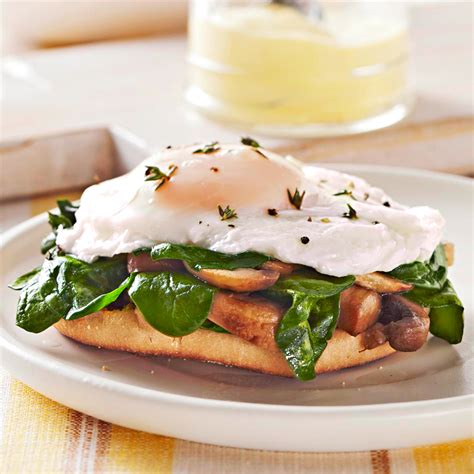mushroom-spinach-eggs-benedict-recipe-eatingwell image