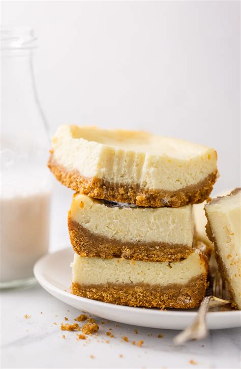 new-york-style-cheesecake-bars-baker-by-nature image
