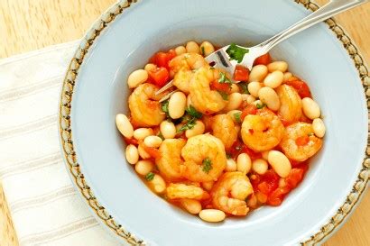 spicy-garlic-shrimp-and-white-beans-with-tomatoes image