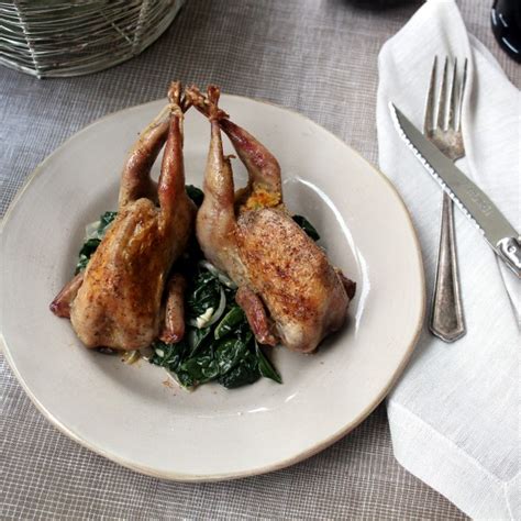 quail-stuffed-with-corn-bread-and-andouille-dressing image