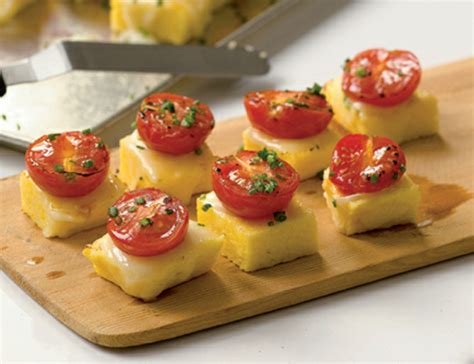 hard-polenta-cakes-with-taleggio-cherry-tomatoes image