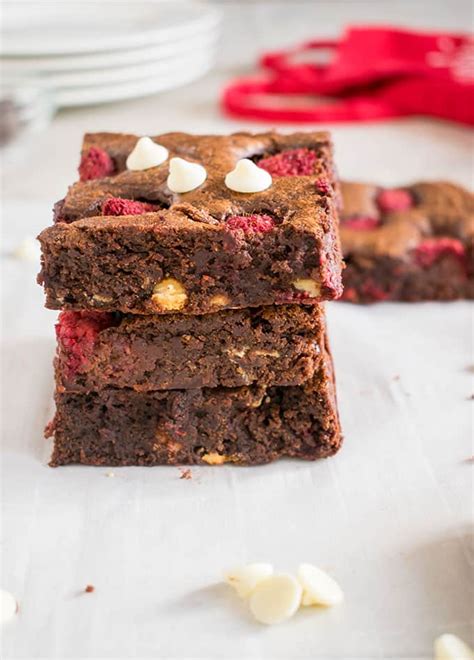 triple-chocolate-brownies-with-raspberries-cooking image