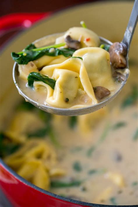creamy-parmesan-spinach-mushroom-and-tortellini-soup image