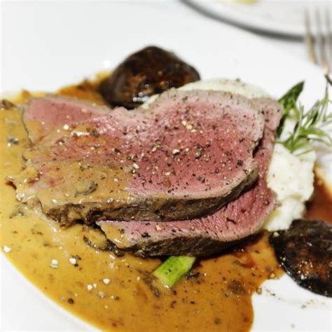 marinated-bison-sirloin-tip-roast-with-herbs-and-wine image