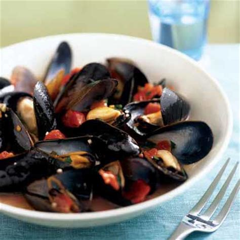 mussels-in-tomato-wine-broth-recipe-myrecipes image