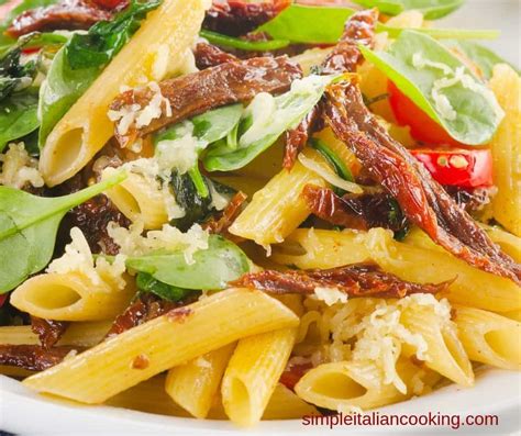 easy-pasta-salad-with-sun-dried-tomatoes-and-kalamata-olives image