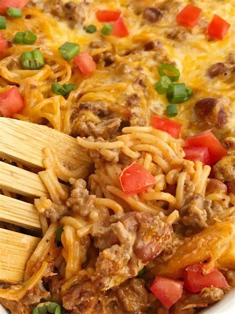 cheesy-taco-spaghetti-casserole-together-as-family image