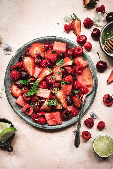 watermelon-fruit-salad-with-berries-and-lime-dressing image