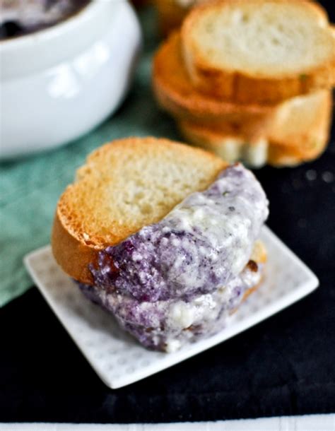 hot-blueberry-cheddar-dip-with-toasty-crostini image