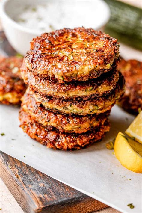 fried-zucchini-cakes-with-sour-cream-dip-easy image
