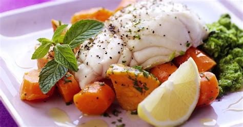 haddock-fillet-over-vegetables-recipe-eat-smarter-usa image