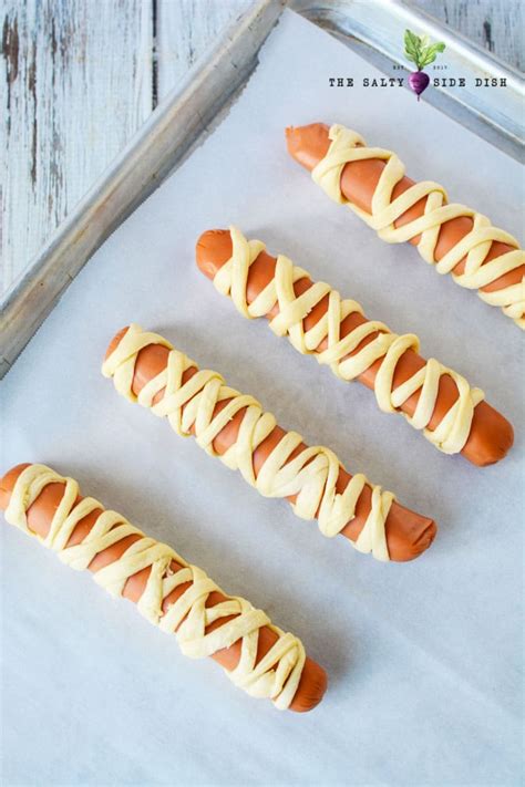 mummy-hot-dogs-with-crescent-rolls-salty-side-dish image