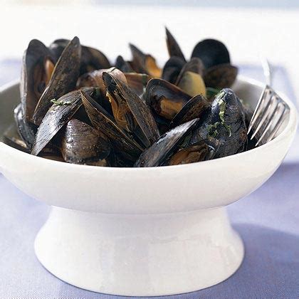 mussels-in-spicy-coconut-broth-recipe-myrecipes image