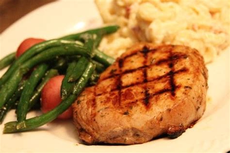 tangy-grilled-pork-chops-southern-bite image