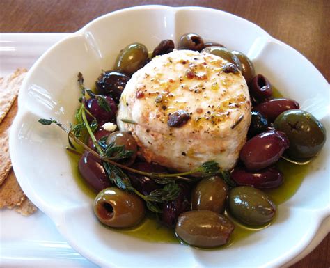 goat-cheese-with-olives-lemon-and-thyme-in-the image