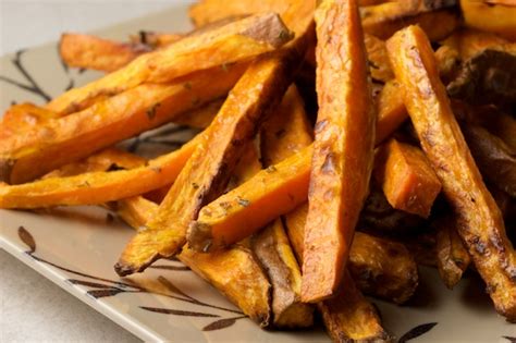 oven-baked-sweet-potato-fries-with-rosemary-and-garlic image