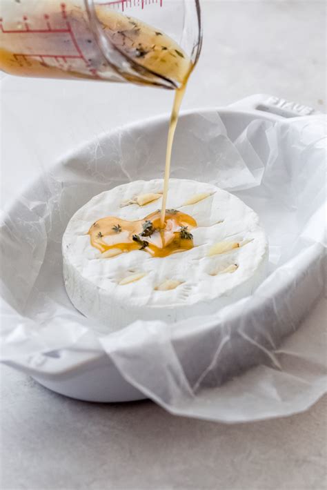 herb-and-garlic-baked-brie-recipe-little-spice-jar image