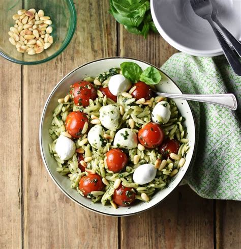 caprese-orzo-pasta-salad-with-pesto-everyday image