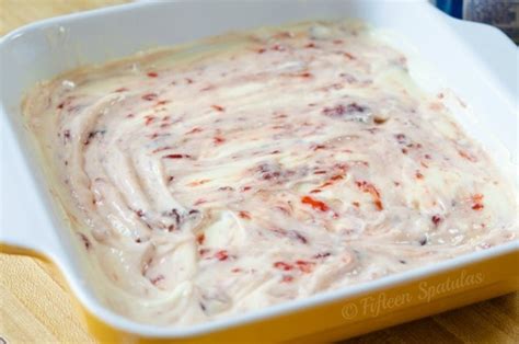 strawberry-swirl-cheesecake-bars-fifteen-spatulas image