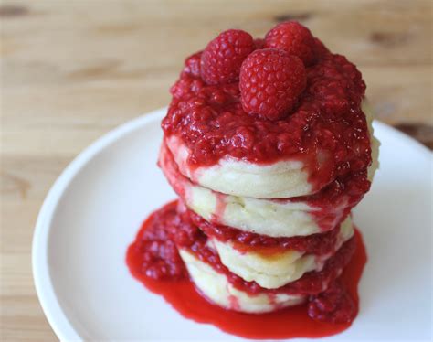 lemon-ricotta-pancakes-with-fresh-raspberry-sauce image