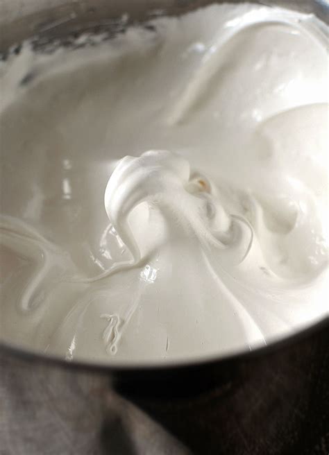 easy-7-minute-vanilla-frosting-recipe-she-wears-many image
