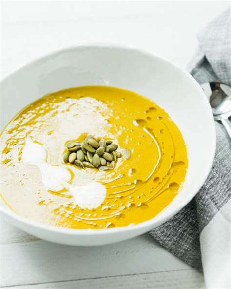 creamy-coconut-curry-soup-a-couple-cooks image