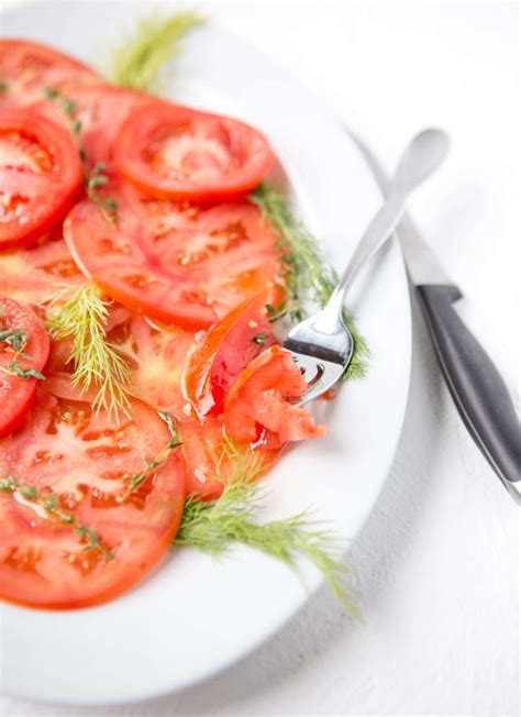 tomatoes-and-herbs-in-ros-vinaigrette-salad-dressing image