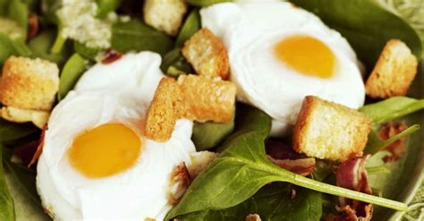 spinach-salad-with-pancetta-croutons-and-quail-eggs image