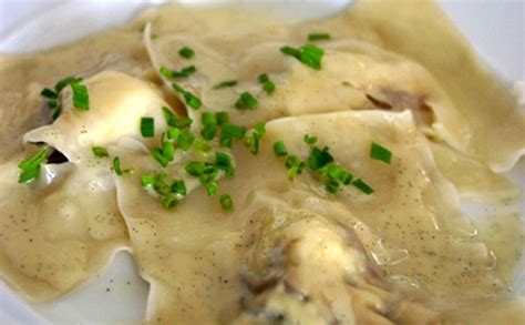 lobster-ravioli-with-vanilla-butter-sauce-the-gilded image