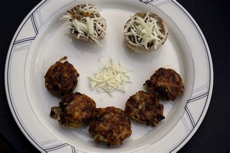 onion-and-cheese-stuffed-mushrooms-spoon image