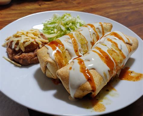 homemade-air-fryer-chimichangas-food image