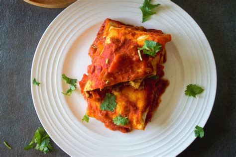 black-bean-and-tempeh-enchiladas-earthly-superfood image