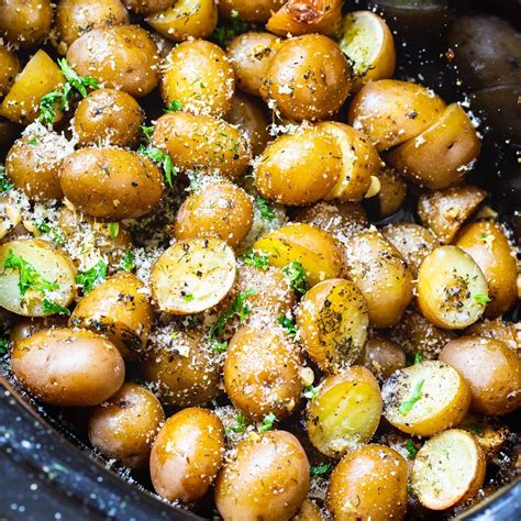 slow-cooker-garlic-parmesan-potatoes-spicy-southern image