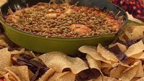 chipotle-queso-with-pumpkin-seeds-and-honey image