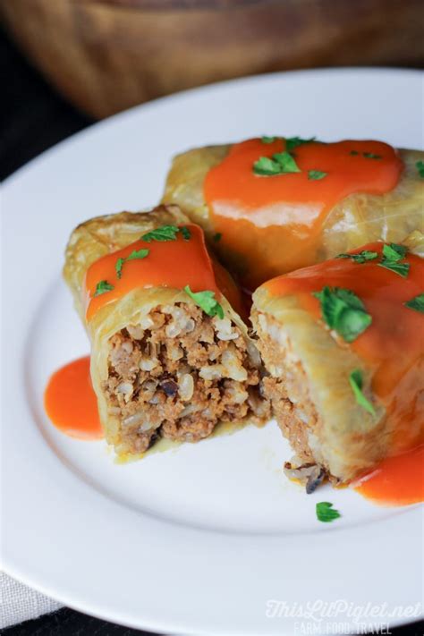 cabbage-rolls-with-hamburger-filling-in-tomato-sauce image