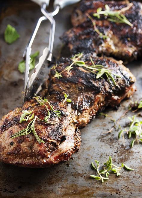 grilled-butterflied-leg-of-lamb-with-a-herb-rub image