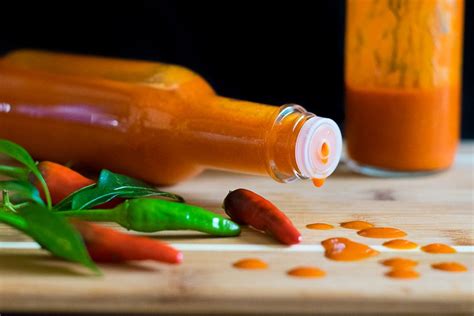 homemade-asian-hot-sauce-with-thai-peppers-fox image