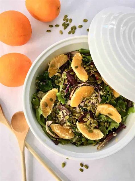 orange-kale-salad-w-citrus-vinaigrette-this-healthy image