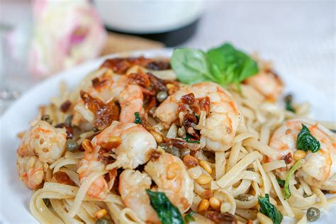 sun-dried-tomato-pasta-with-shrimp-capers-basil-and image