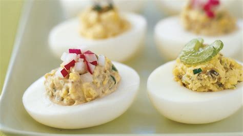 deviled-eggs-with-capers-and-tarragon-recipe-bon-apptit image